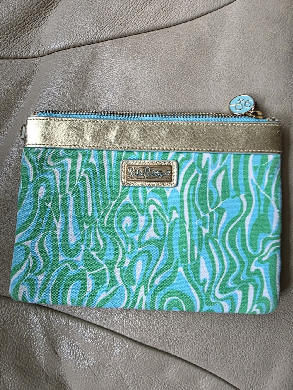 Lilly Pulitzer Wanderlust Pouch in the "Finders Keepers" green and white pattern